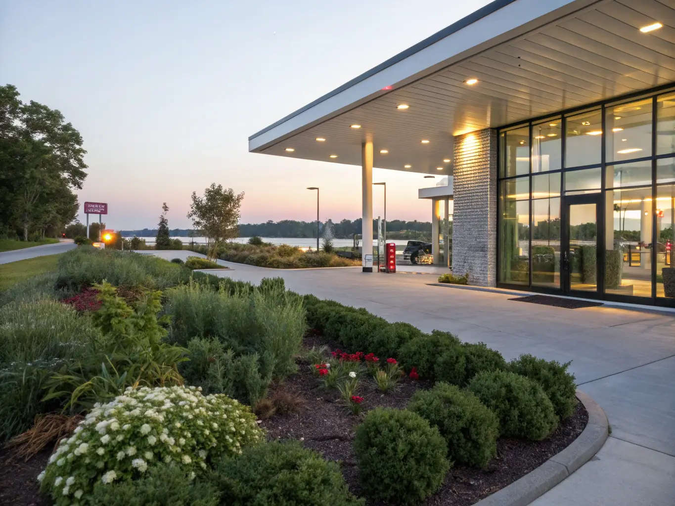 A modern gas station with Oilway Petroleum branding, showcasing retail fuel options and convenience store.